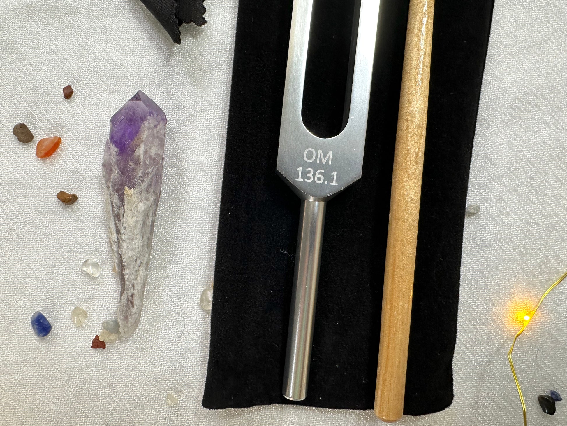 aluminum 136.1 Hz tuning fork, with amethyst crystal point, mallet and mala-printed cleaning cloth. OM Frequency