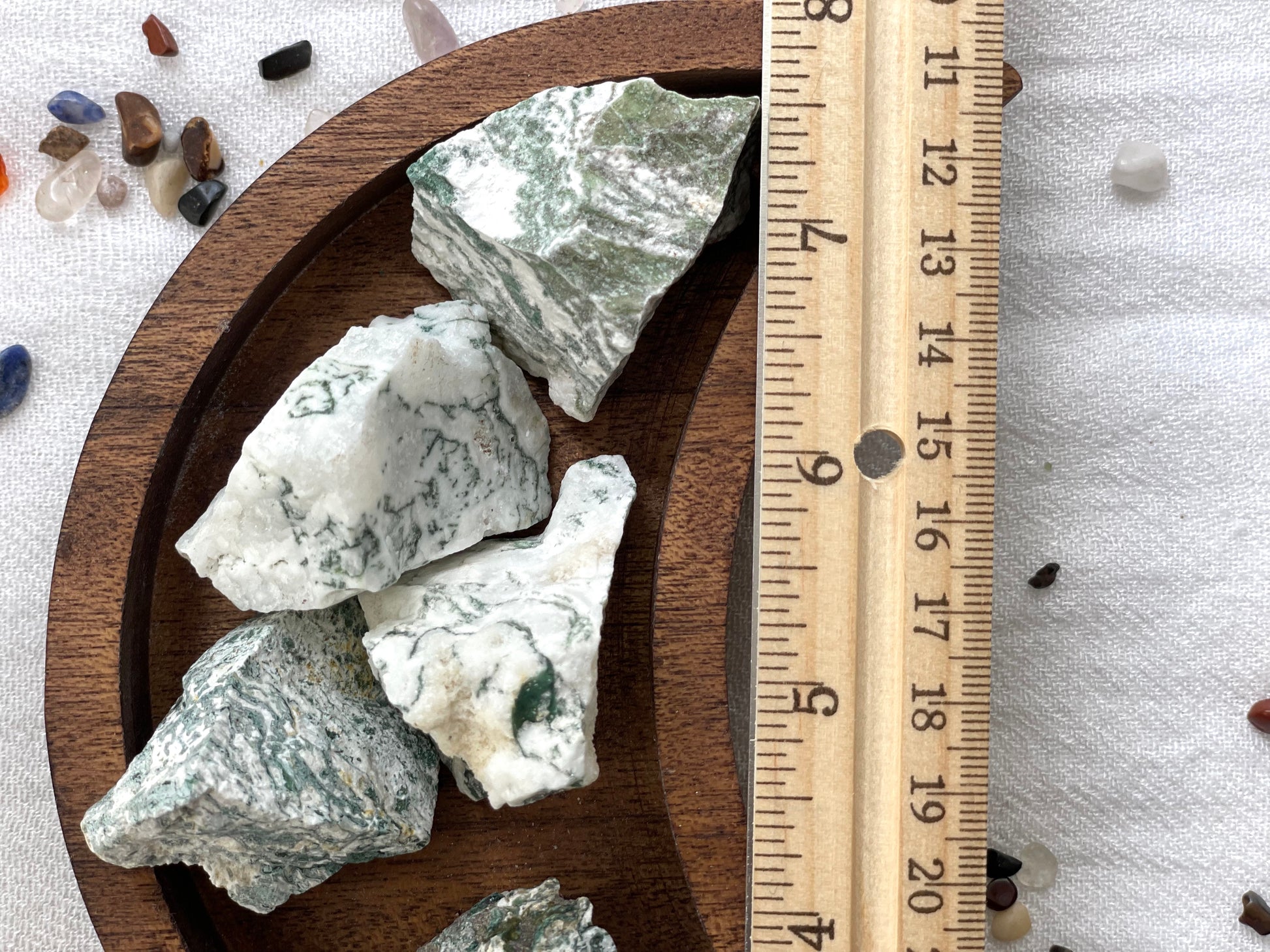 Rough Tree Agate crystals against a ruler, average size 1.5 inch