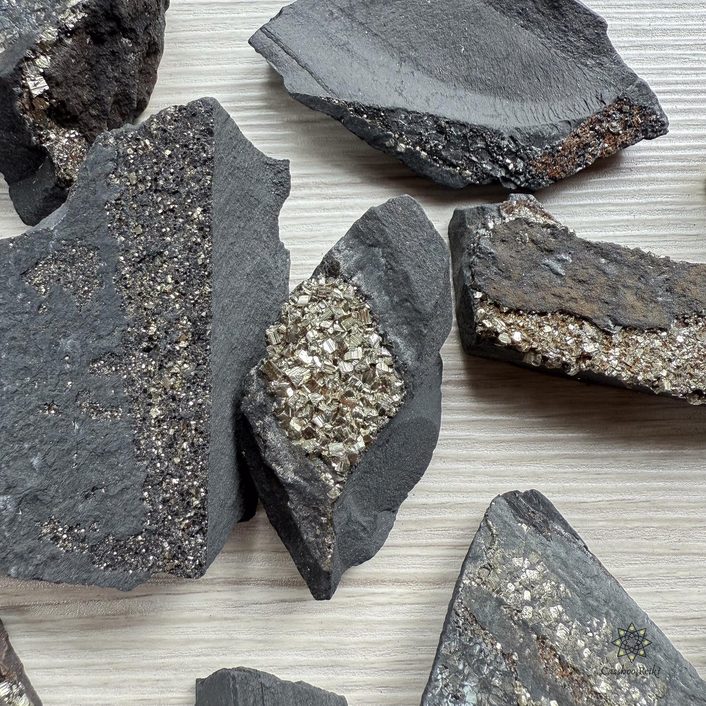 Rough Shungite with Pyrite. Crystal for Purification, Protection, and Prosperity