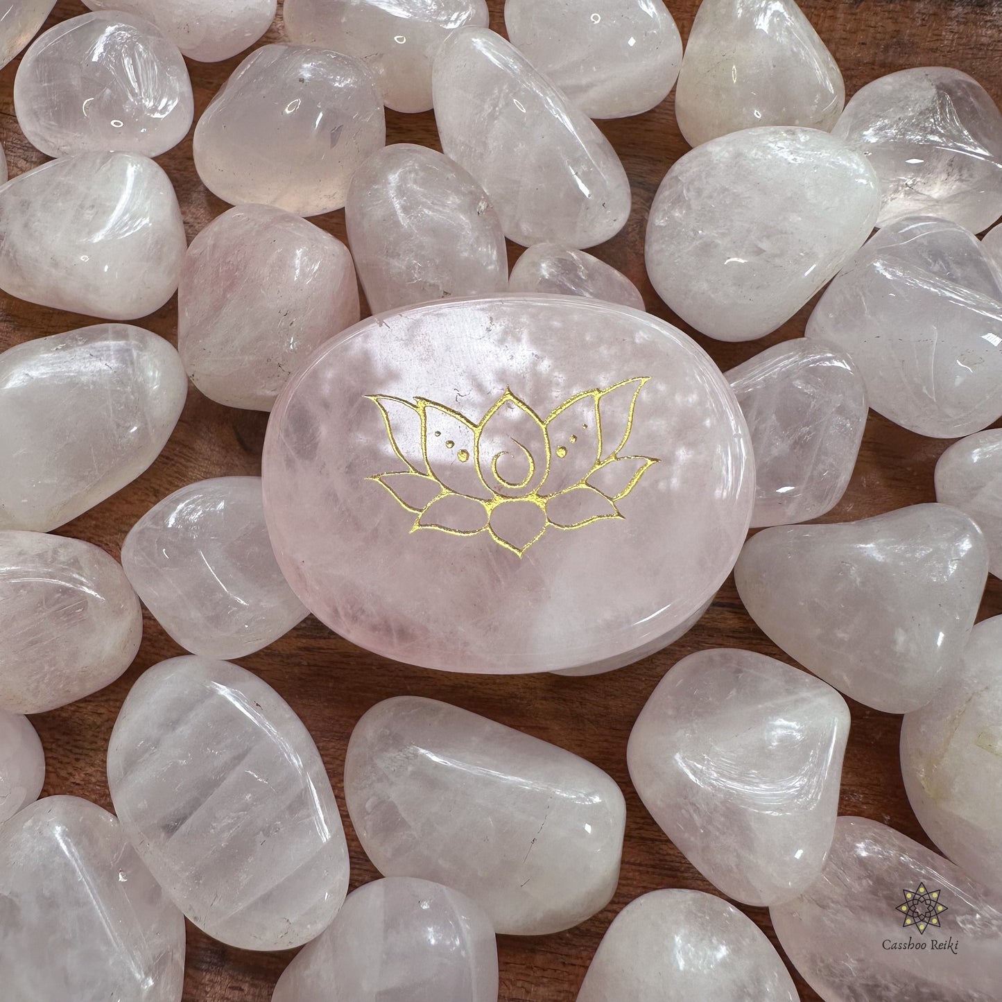 Engraved palm stone. Lotus flower in Rose Quartz