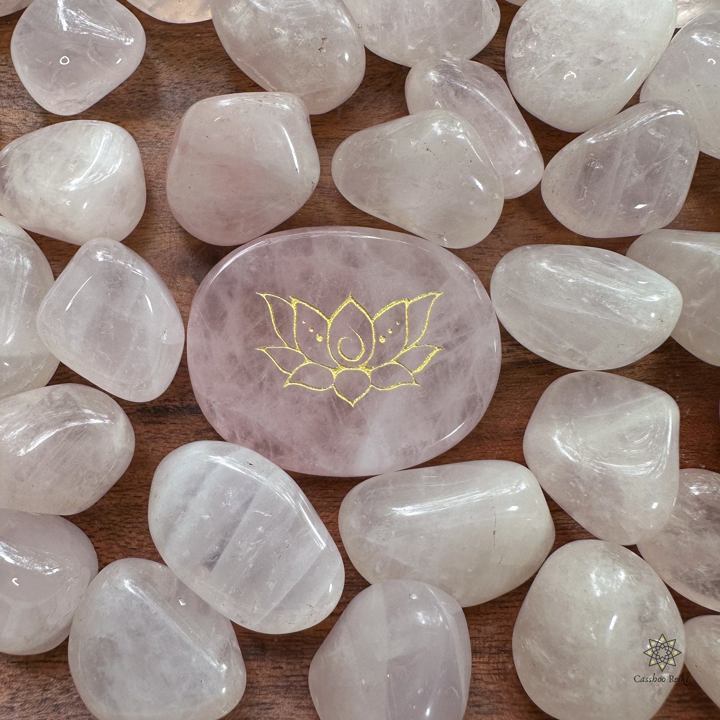 Engraved palm stone. Lotus flower in Rose Quartz