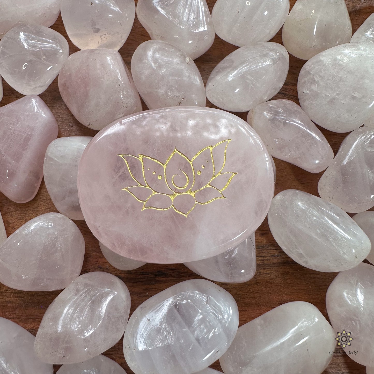 Engraved palm stone. Lotus flower in Rose Quartz