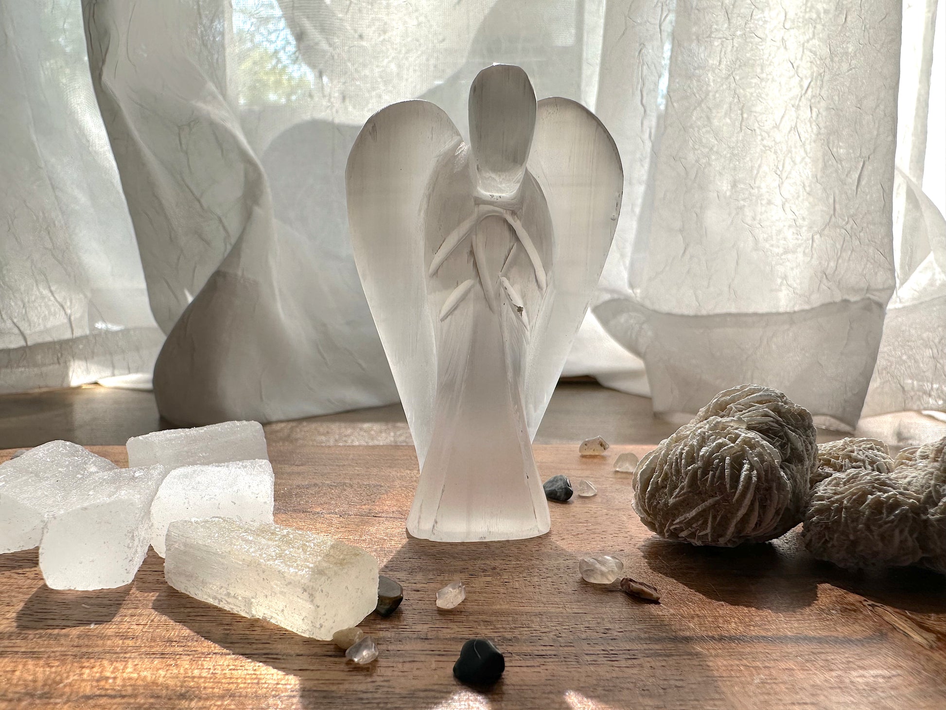 Small selenite carved angel for altar or sacred space