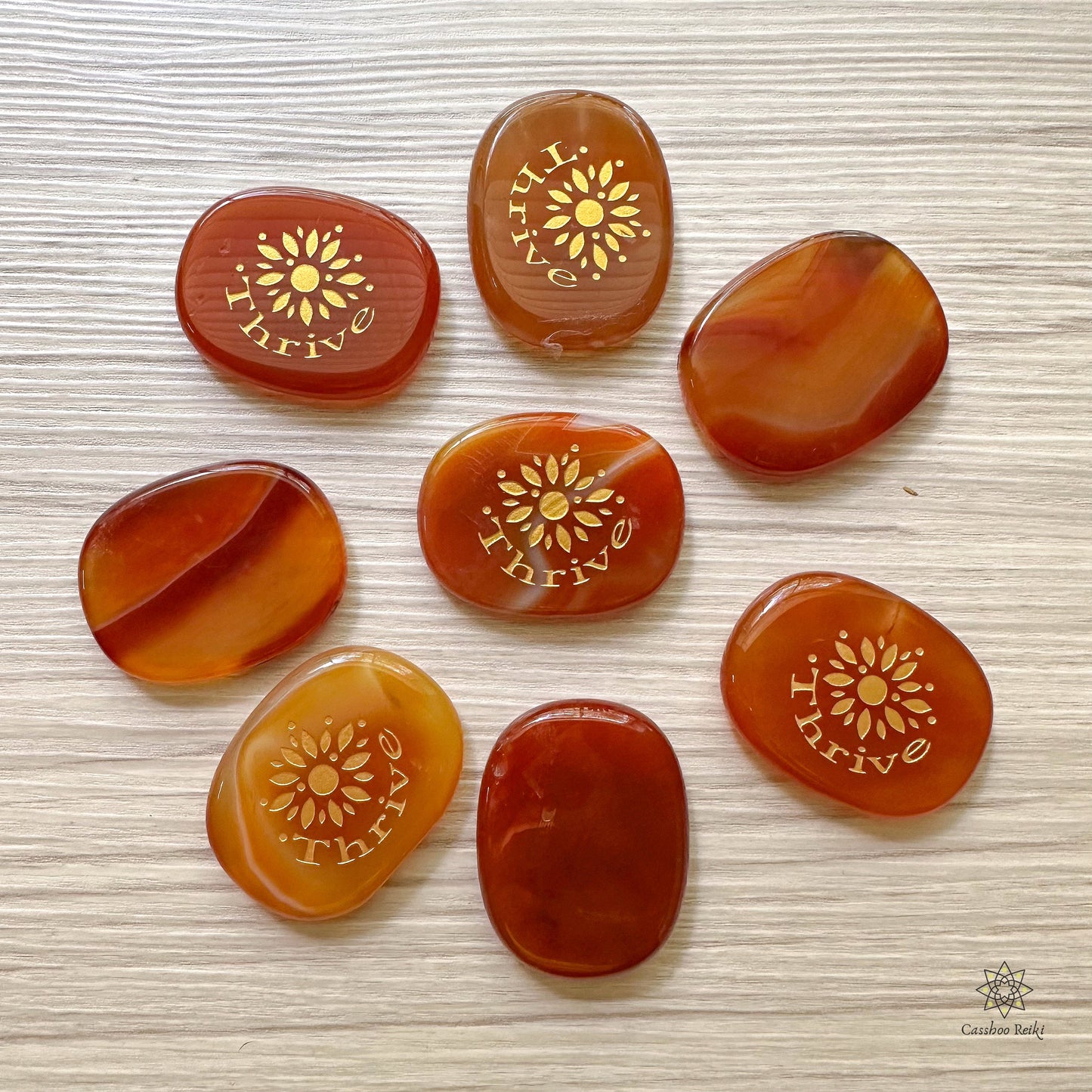 Engraved Palm Stone. Thrive in Carnelian | Sacral Chakra Stone