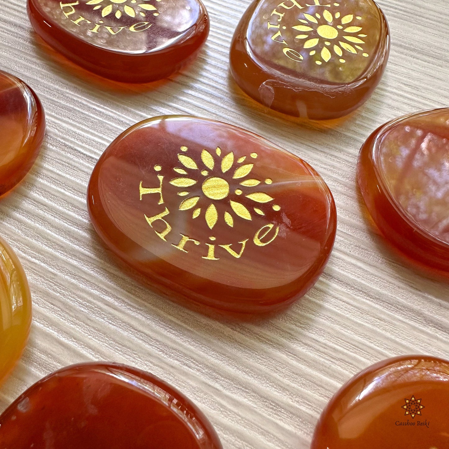 Engraved Palm Stone. Thrive in Carnelian | Sacral Chakra Stone