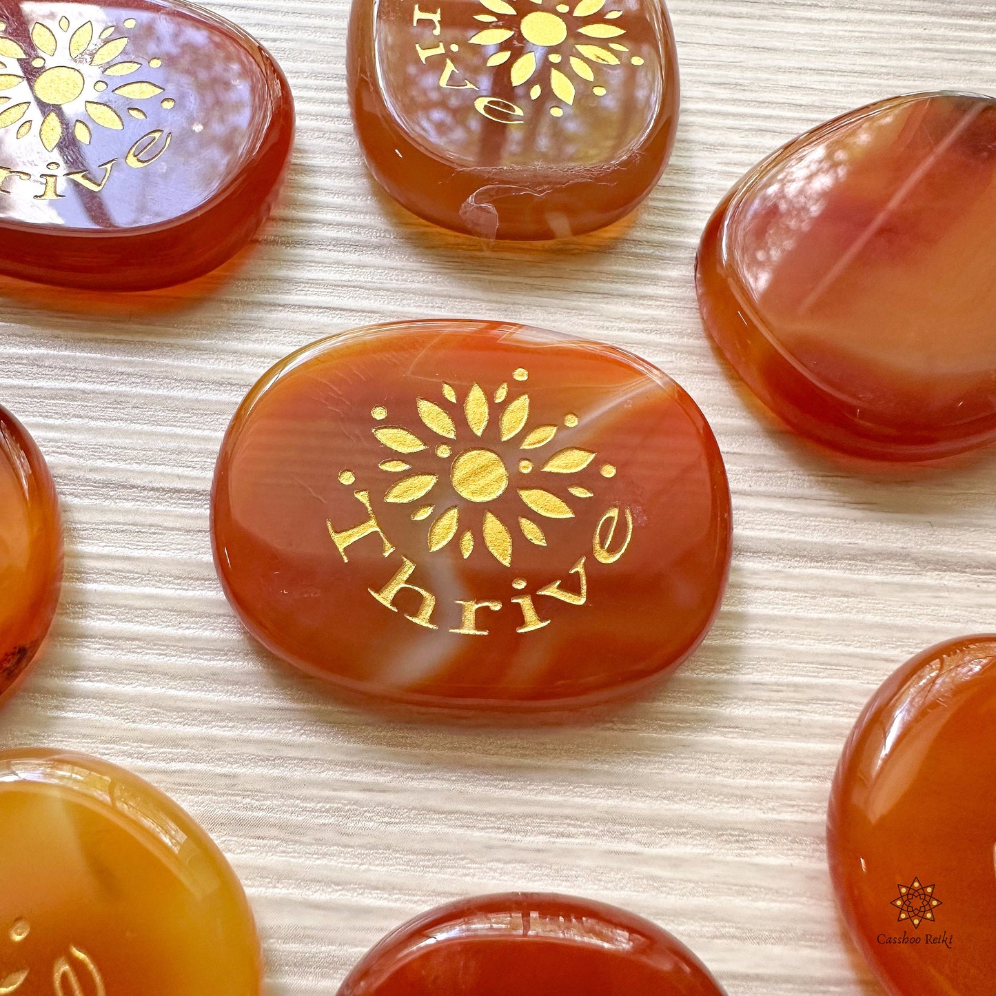 Engraved Palm Stone. Thrive in Carnelian | Sacral Chakra Stone