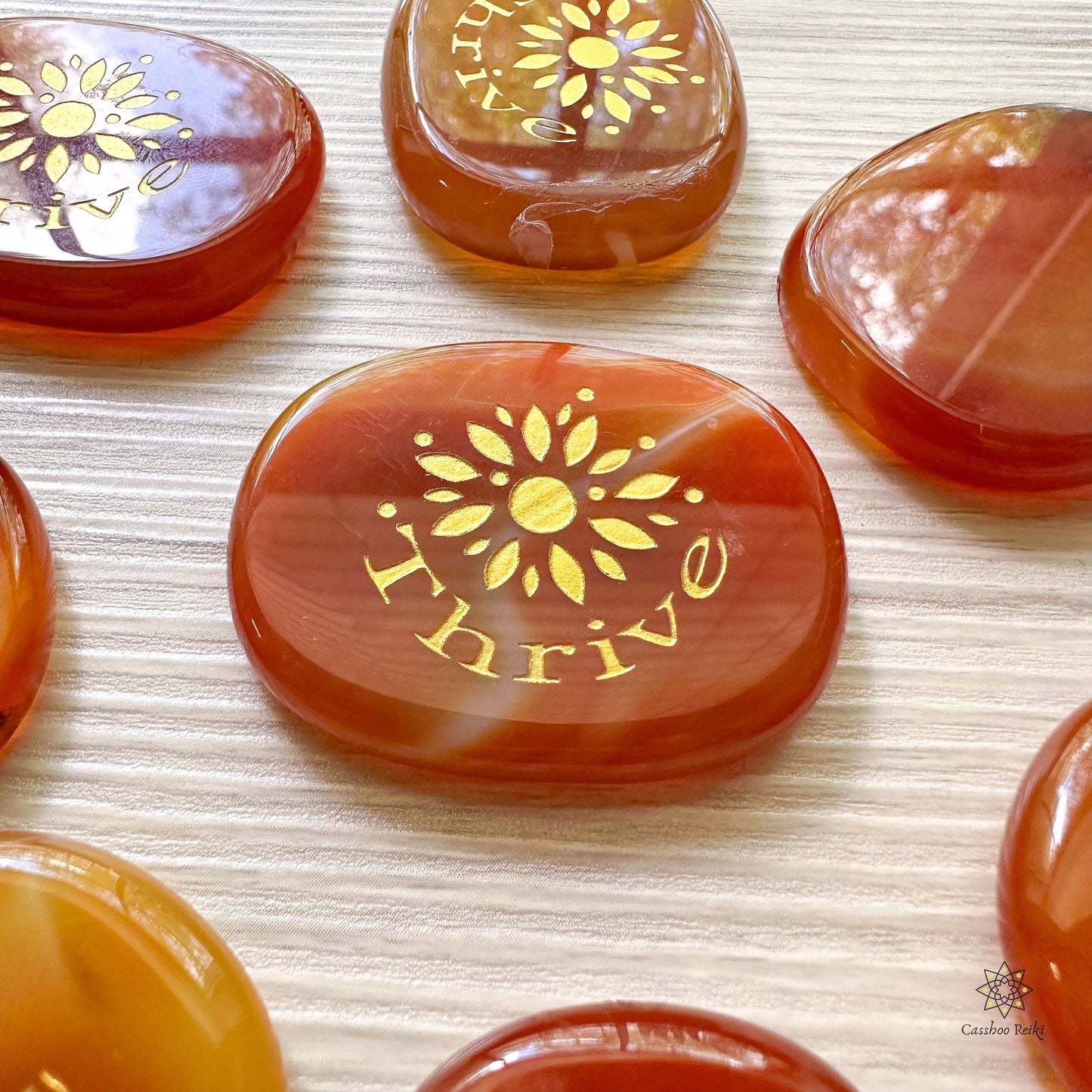 Engraved Palm Stone. Thrive in Carnelian | Sacral Chakra Stone