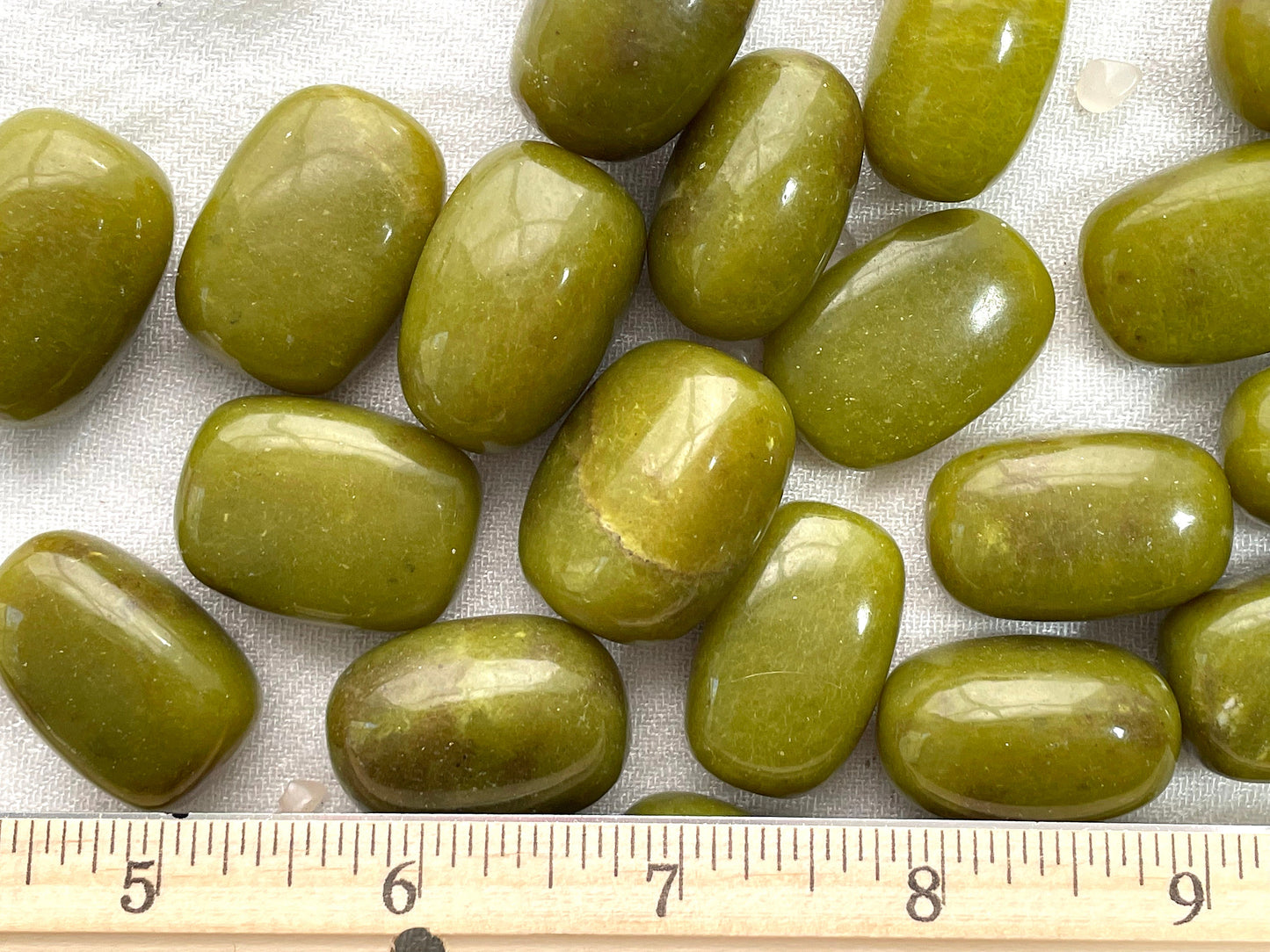 Olive Jade (Serpentine). Tumbled
