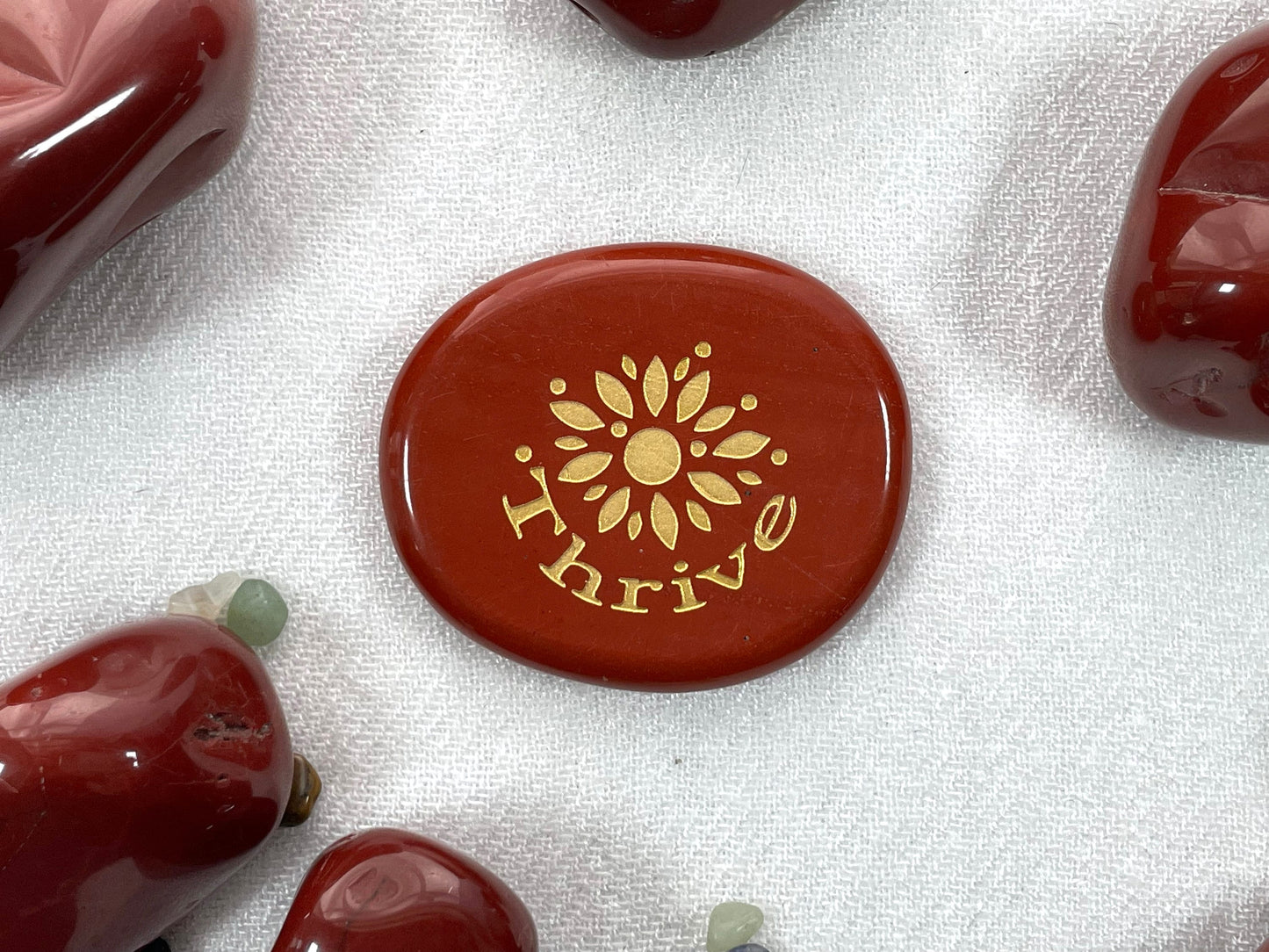 "Thrive" Engraved Palm Stone in Red Jasper