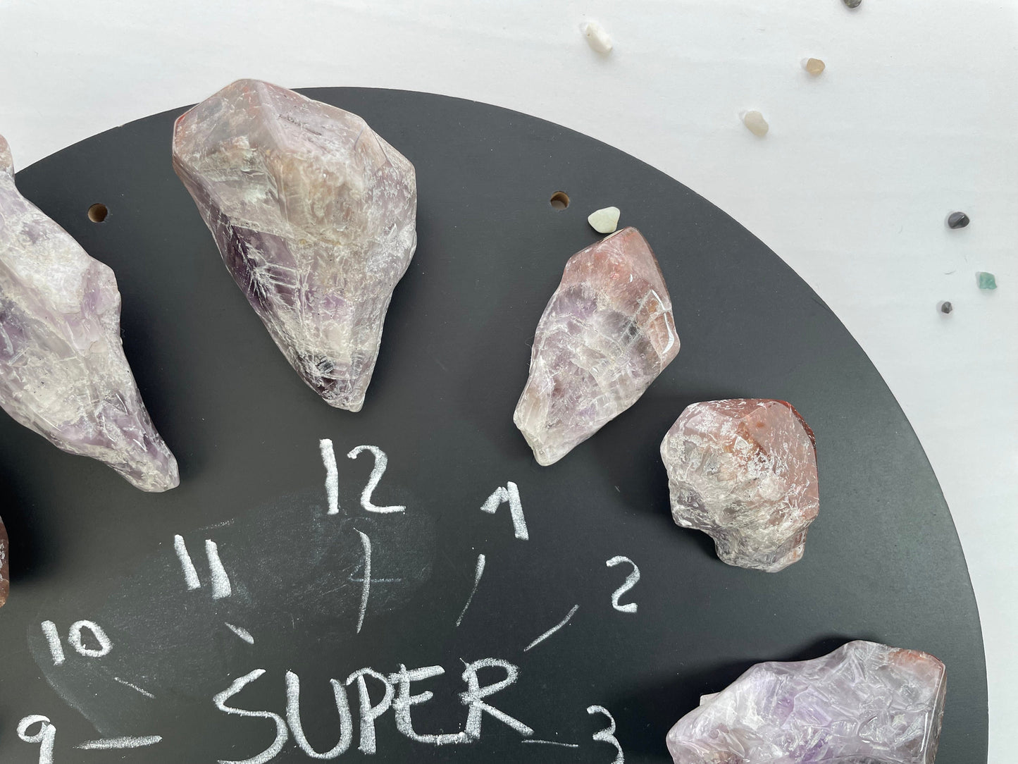 Polished Super 7 crystal points